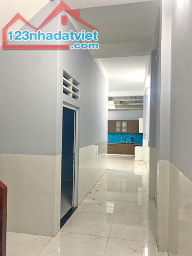 Cho thuê nhà 2 lầu mặt tiền Gò Ô Môi, Phường Phú Thuận, Quận 7 - 2