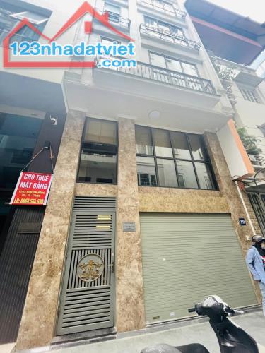 Bán nhà phố Nguyên Hồng, Đống Đa, ô tô tránh, vỉa hè, thang máy, giá 27 tỷ