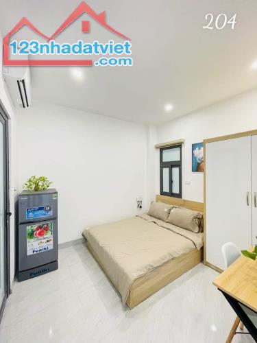 Bán toà nhà CCMN Lê Thanh Nghị 33 phòng ngõ to rộng ô tô DT 95 m2 giá 23 tỷ - 1