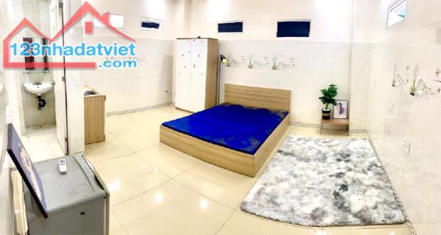 MẶT TIỀN LÊ VĂN THỌ THU NHẬP 100TR 5.2x28 5LẦU THANG MÁY CHỈ 3X Tỷ - 1
