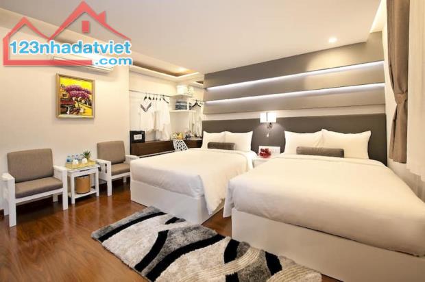 Toà Motel dòng tiền khủng, mặt phố Trương Định - 26 phòng, thu nhập 300tr/tháng - 1