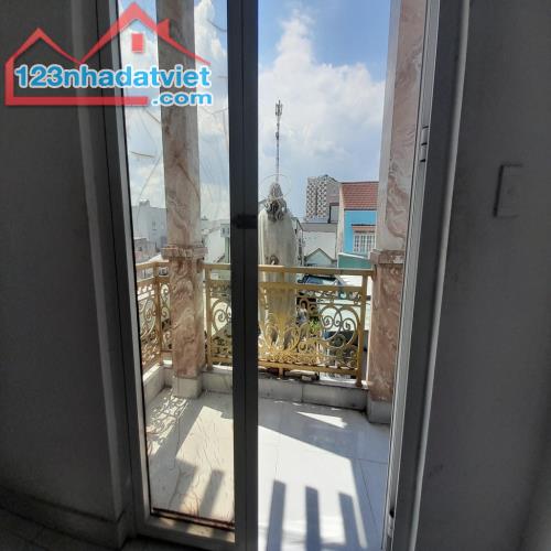 Bán nhà hẻm ô tô cách 1 căn ra đường Đặng Văn Bi, phường Trường Thọ, Quận Thủ Đức _ 4 tầng - 2