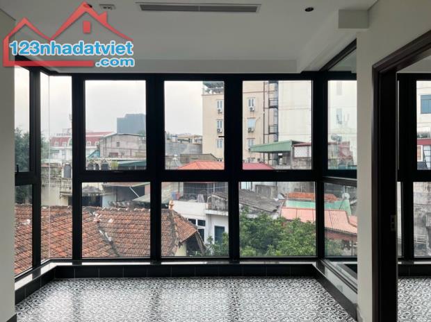 Bán nhà mặt phố Trần Hưng Đạo hoàn kiếm lô góc 3 mặt thoáng có thang máy giá 32 tỷ - 2