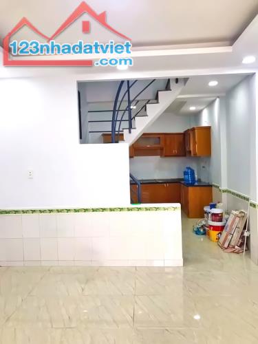 Nhà 2 lầu hẻm 47 Võ Thị Nhờ, Phường Tân Thuận Đông, Quận 7 - 1