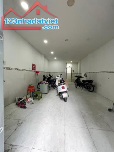 Nhà mới 5 tầng (có 12 phòng cho thuê) 2 mặt hẻm HXH đường Nguyễn Tiểu La P5Q10 - 2