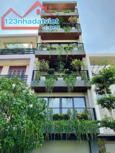 Bán nhà mặt phố Đường Láng, Đống Đa. 97 m2 x 6T x Mt 6,2 m. Ô tô Văn Phòng kinh doanh.