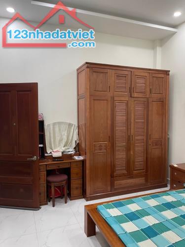 Mặt tiền đường nhựa 14m 2 tầng 70m2 12.5 tỷ thu nhập 17tr/tháng. Tân Quy Quận 7 - 1