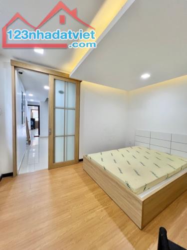 CHDV MẶT TIỀN 8LẦU THU NHẬP 80 TR THANG MÁY VỊ TRÍ VIP QUẬN 12 - 2