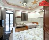 Cho thuê phòng đầy đủ nội thất, tiện nghi rộng rãi có ban công ở Huỳnh Tấn Phát, Quận 7