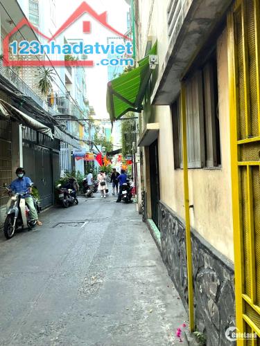 NHÀ TRẦN QUANG KHẢI, GẦN CHỢ TÂN ĐỊNH, QUẬN 1, 2 MẶT HẺM THÔNG, DÂN TRÍ, 45Mx2 2PN, 4 TỶ X