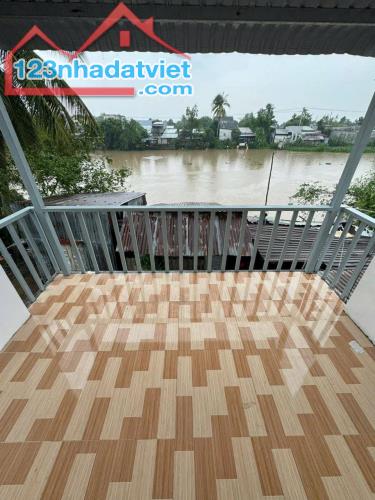 bán nhà lầu hẻm 8 nguyễn chí thanh gần khu công nghiệp 40m2 thổ cư 2pn view sông 830tr - 2