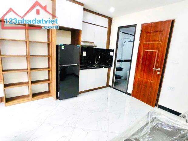 Bán tòa nhà 7 tầng CHDV Tây Sơn, 75m2, Ô tô qua nhà - 2