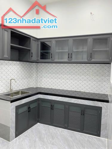 Nhà đẹp 1 lầu hẻm xe hơi 154 Âu Dương Lân P3Q8 - 2