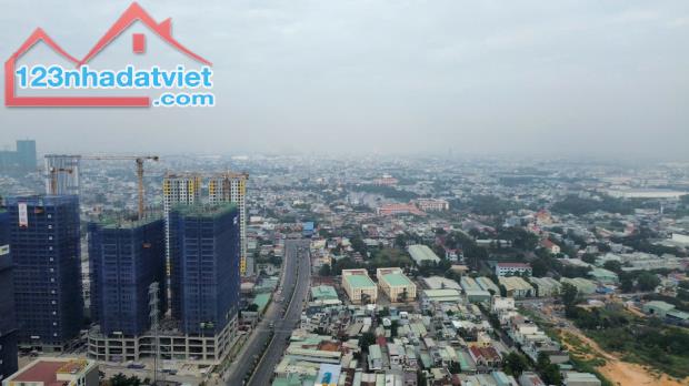 Bán Nhà Mặt Tiền  Đường Thống Nhất Dĩ An 5.58×22.5 Đối Diện Bcons city - 2