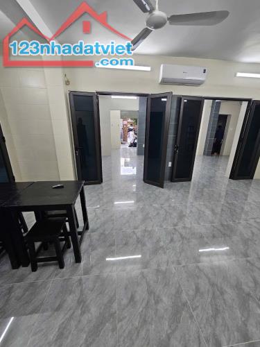 Bán nhà tập thể T1 mặt phố Bùi Ngọc Dương, HBT. Dt 130 m2, Mt 9m. Ô tô kinh doanh cho thuê - 2