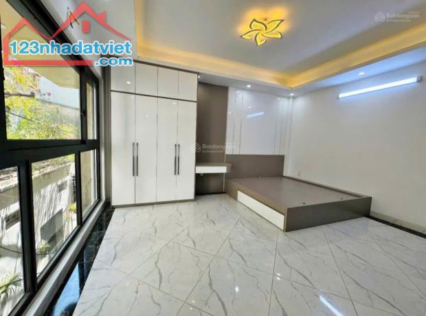 Bán nhà Đội Cấn Ba Đình. Nhà ngay cạnh mặt phố, ô tô đỗ cổng 34m2 6,5 tầng - nhà mới, có - 1