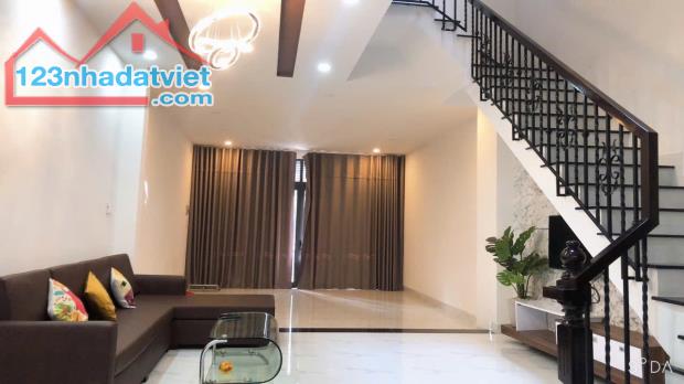 Bán nhà mặt tiền đường A2 KĐT VCN Phước Hải sổ hồng hoàn công
