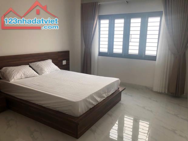 Bán nhà mặt tiền đường A2 KĐT VCN Phước Hải sổ hồng hoàn công - 2