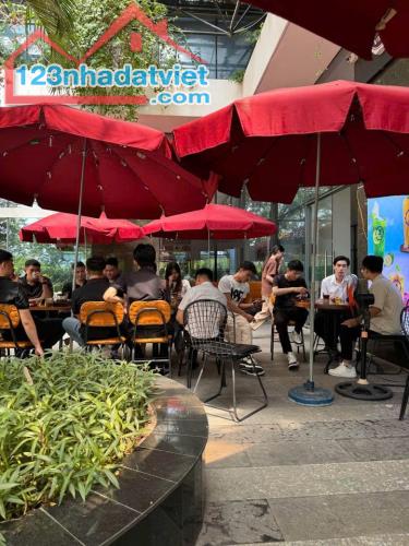 SANG NHƯỢNG QUÁN CAFE TẠI CHÂN ĐẾ TÒA NHÀ VĂN PHÒNG - 1