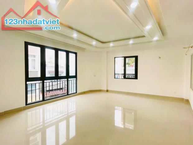 Nhà 4 tầng xây mới, 40m2, 4PN HXH đường Hoàng Hoa Thám - 1