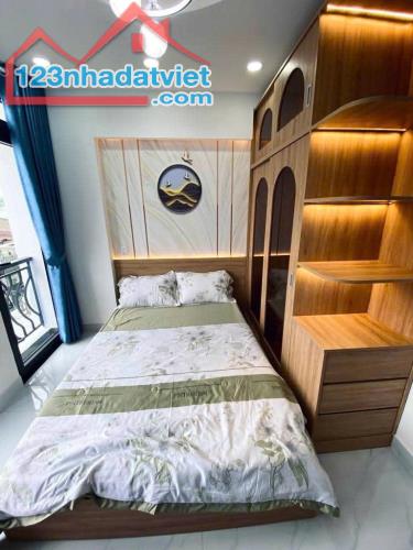--Bán nhà đường Cửu Long, phường 2, Tân Bình; 5x10 – 4 tầng nhà đẹp - 1