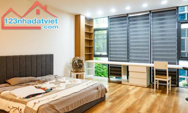 Bán nhà mặt phố Nguyễn Văn Lộc thang máy kinh doanh ô tô tránh 56m2 7 tầng - 2