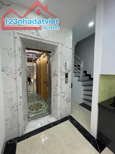 NHÀ ĐẸP KHƯƠNG HẠ, 7 TẦNG THANG MÁY, NGÕ NÔNG, 20M RA Ô TÔ GIÁ 9,3 TỶ - 2
