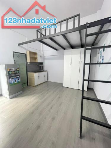 Căn hộ dịch vụ Khu Dân Cư Tân Quy Đông có Hầm, Thang Máy, 5 tầng, 60m2, thu nhập - 2