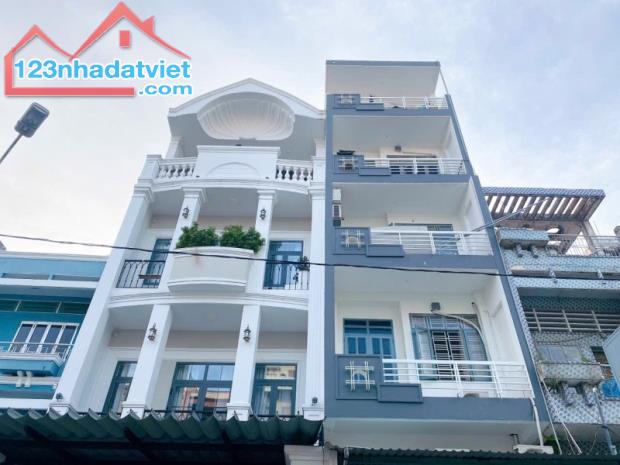 Bán nhà MTKD Phan Xích Long, có hẻm sau 3m, 5 Tầng chỉ 9 tỷ 85 tl