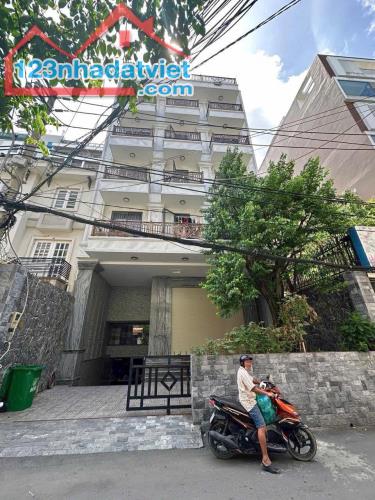 Bán Tòa CHDV Lạc Long Quân - 251m2 x 9T - Tầng hầm Thang máy - Ngõ thông oto đỗ cổng