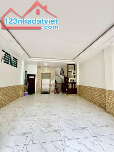 Bán tòa Building mặt phố Đông Quan, Cầu Giấy, 60m2, 7 tầng, thang máy, giá 25 tỷ - 1