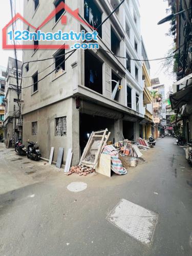 Bán nhà Lô Góc Ngõ Ôtô, K.Doanh-Phố Hoàng Quốc Việt 51/55mx5Tầng/MT 5.2m 21 Tỷ