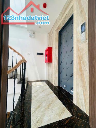 Bán toà nhà VP Nguyễn Chí Thanh - 85m x 7 tầng thang máy, ôtô đỗ cửa, MT 8m - 2