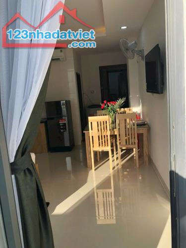 Bán toà căn hộ 7 tầng mặt tiền Lê Đại Hành DT106,7m2 ngang9m Giá 25 Tỷ - 1