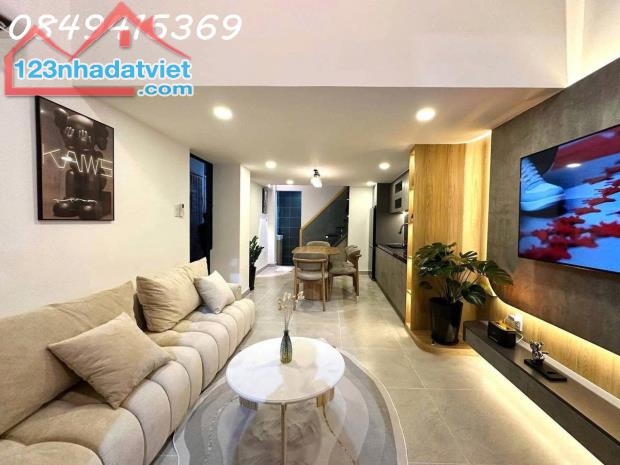 Nhà  Căn Góc 3 MT HXH Trường Sa trung tâm quận 3,- 5 tầng 36m2 sổ vuông Hoàn Công đủ - 1