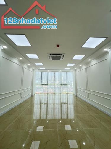 Bán tòa văn phòng mặt phố quận Cầu Giấy, giá 45,5 tỷ, 80m2, 6 tầng, vỉa hè rộng - 1