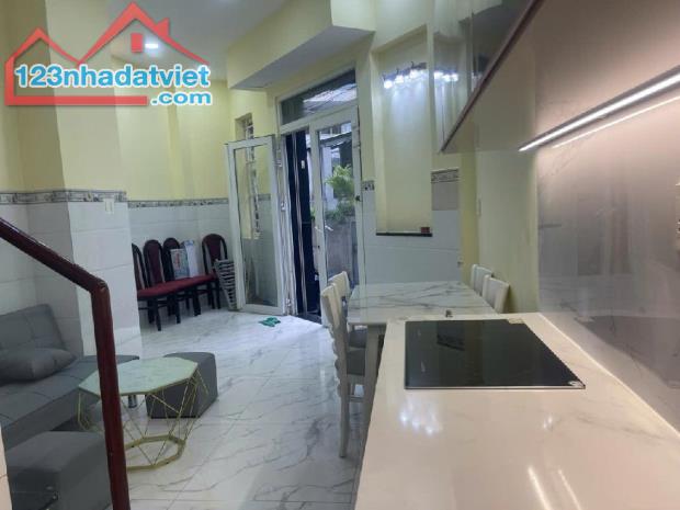 BÁN NHÀ MỚI 4 TẦNG, MẶT TIỀN CẬN, HẺM Ô TÔ 4m THÔNG, DƯỚI CHÂN CẦU KIỆU Q1
