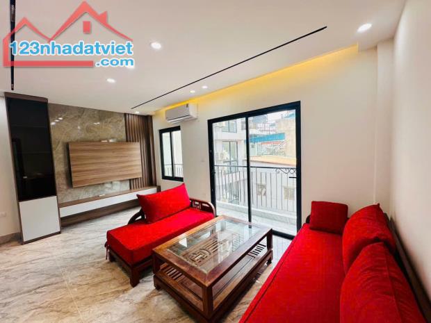 Cách 1 nhà ra mặt phố Tôn Đức Thắng - 7 tầng - có thang máy