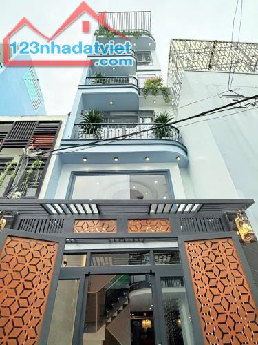 HÀNG HOT-NHÀ ĐẸP MỚI XÂY-1 TRỆT+3 LẦU+ST-DT:4Mx15,5M NỞ HẬU 4,5M-CÓ THANG MÁY-HXH