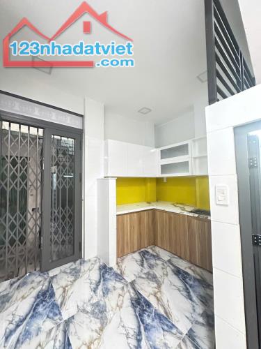 Nhà mới 3 tầng hẻm thông 39 Dạ Nam Phường 2 Quận 8 - 1