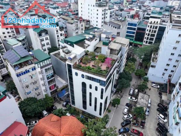 (Tin thật 100%) Bán tòa nhà VP 3 mặt tiền ô tô tránh 186m2 x 8T tại phố Trần Thái Tông - - 1