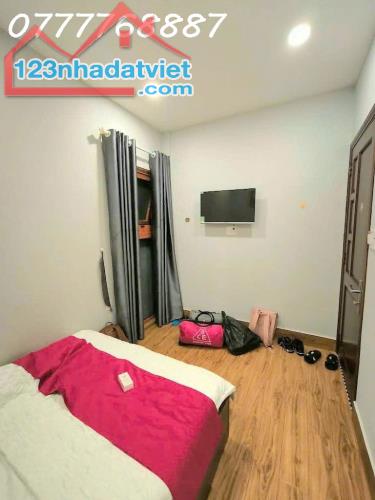 Bán khách sạn gần Khu đô thị Phú Mỹ Hưng Quận 7 - 5 tầng 34 phòng - 3