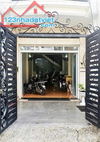 Cho thuê nhà 4 tầng MTKD Khu K300 P.12 Tân Bình - 1