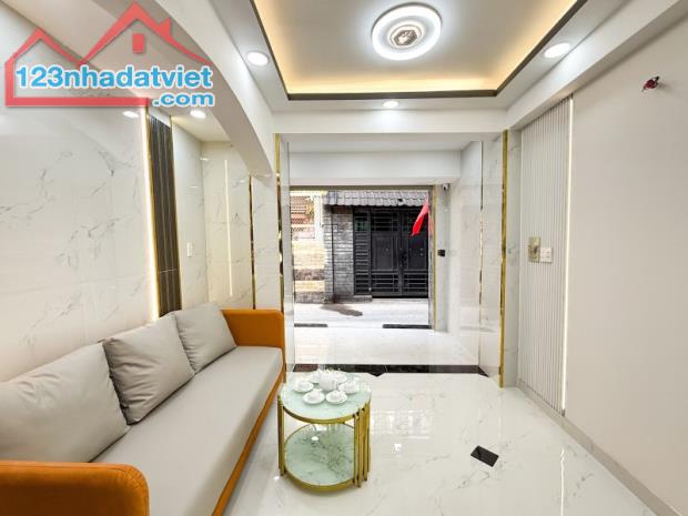 BÁN NHÀ PHÚ NHUẬN HXH 45M2 4 TẦNG 5 PN ĐẸP HẺM THÔNG KD LÊ VĂN SỸ 6.9 TỶ.