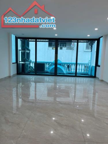 (Tin thật 100%) Bán tòa VP kết hợp CHDV 80m2 x 9T tại phố Đê La Thành - Kim Mã - Phân lô - 2