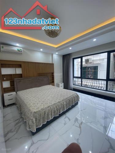 Bán nhà ngõ 106 Hoàng Quốc Việt 50 m2, 6 tầng có thang máy, ngõ thông, 2 ô tô tránh - 2