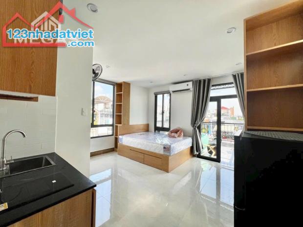 BÁN TÒA NHÀ 13 CĂN HỘ DỊCH VỤ CAO CẤP MẶT TIỀN PHẠM VĂN ĐỒNG  4 TẦNG - NGANG 9M - NGAY - 2
